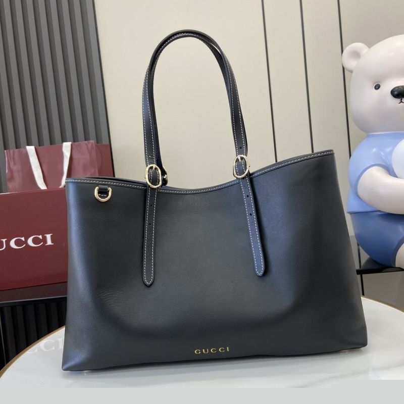G*u*i shopping bags